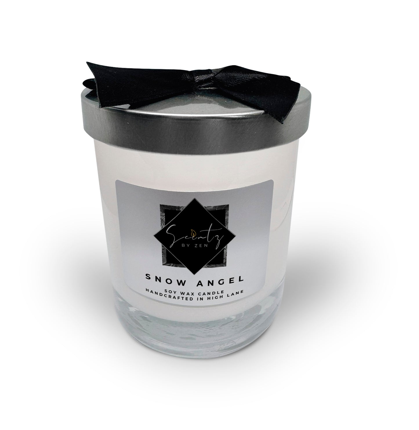 7oz White soy wax candle in a glass jar, labeled "Snow Angel" topped with a silver lid and black ribbon, handcrafted in High Lane.