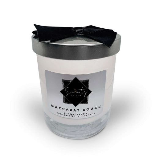 7oz White soy wax candle in a glass jar, labeled "Baccarat Rouge" topped with a silver lid and black ribbon, handcrafted in High Lane.