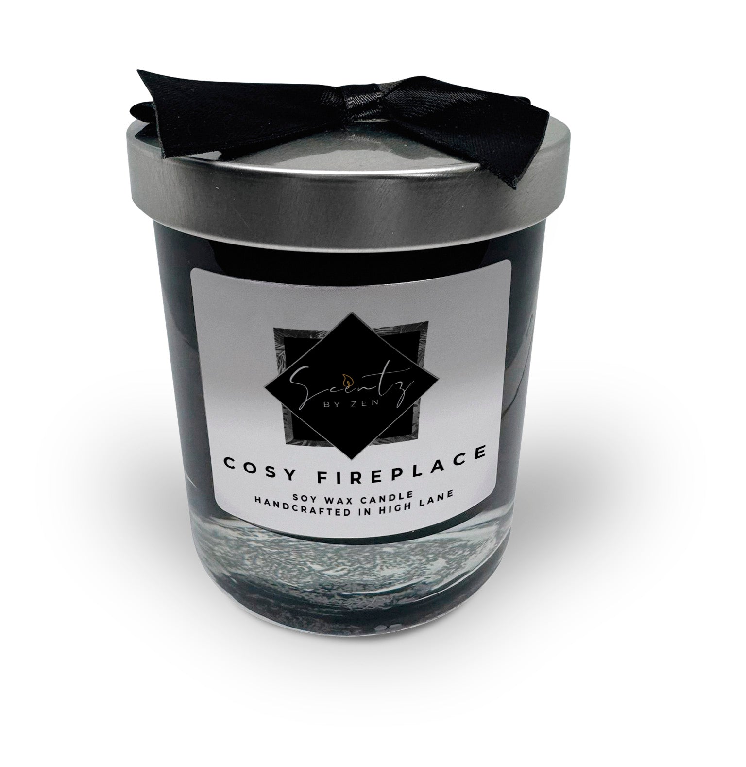 10oz Black soy wax candle in a glass jar, labeled "Cosy Fireplace" topped with a silver lid and black ribbon, handcrafted in High Lane.