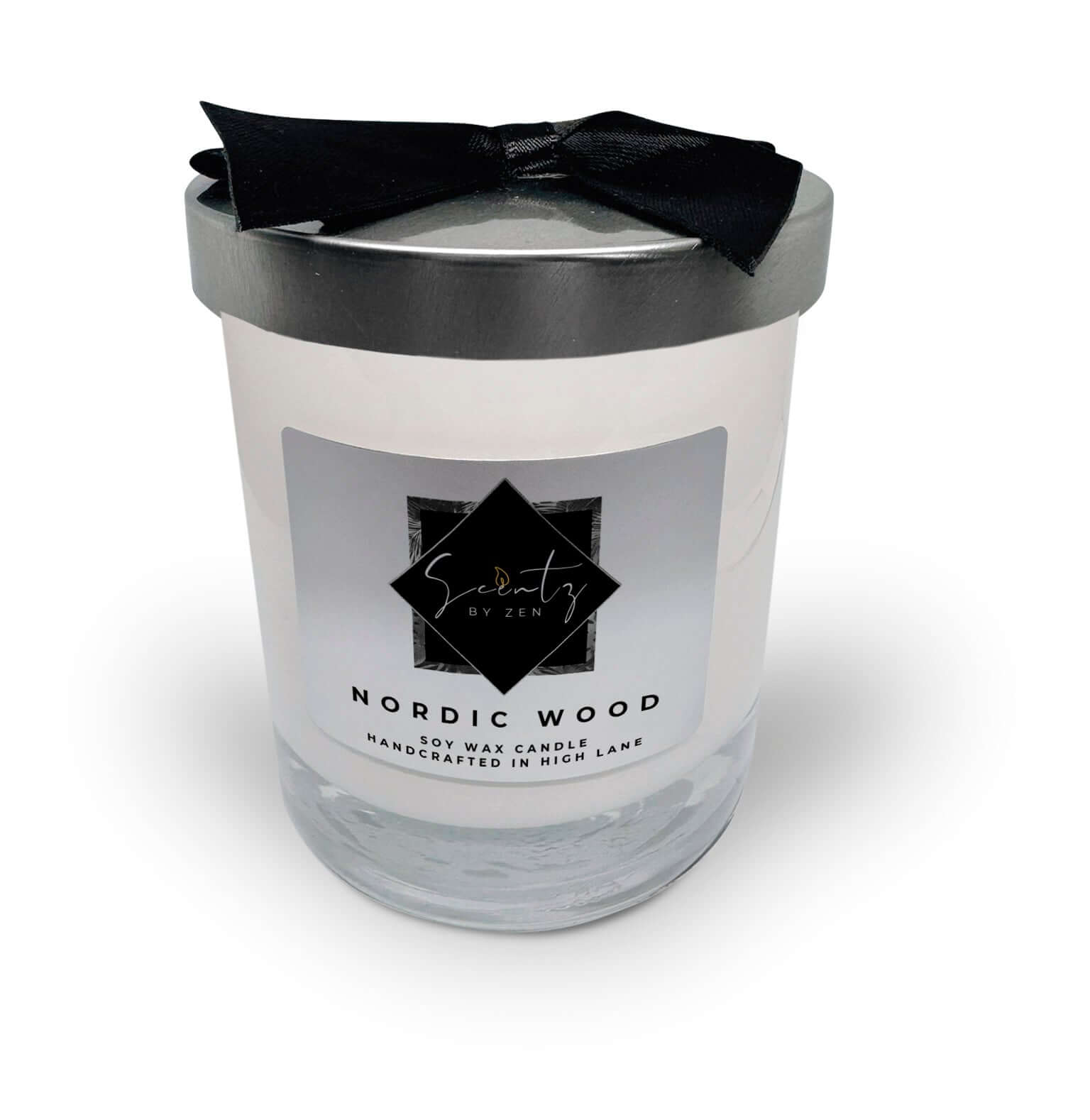 10oz White soy wax candle in a glass jar, labeled "Nordic Wood" topped with a silver lid and black ribbon, handcrafted in High Lane.