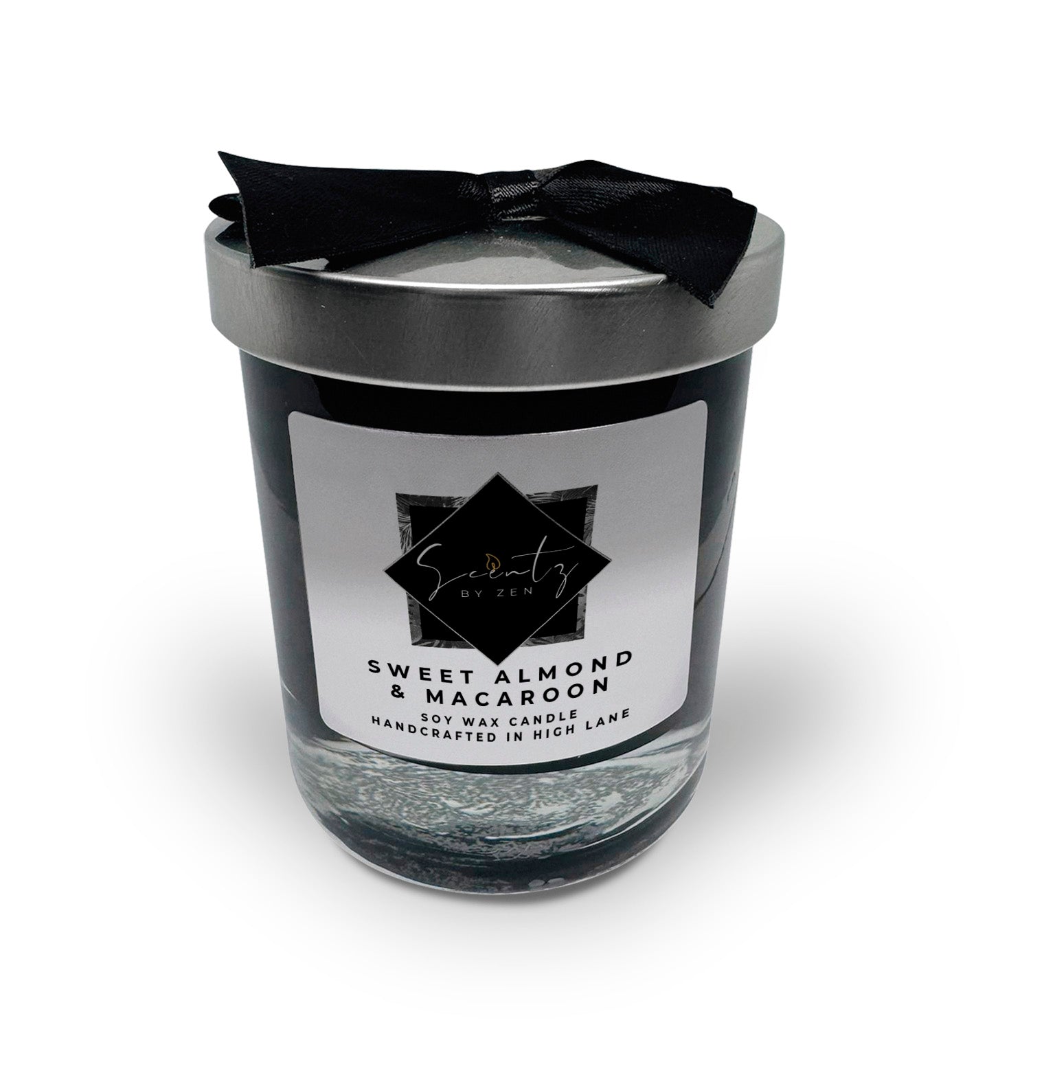 7oz Black soy wax candle in a glass jar, labeled "Sweet Almond & Macaroon" topped with a silver lid and black ribbon, handcrafted in High Lane.